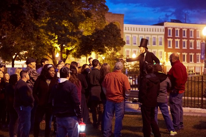 Matt Boire of The Greater Adirondack Ghost & Tour Company leading an evening ghost tour in Plattsburgh NY.