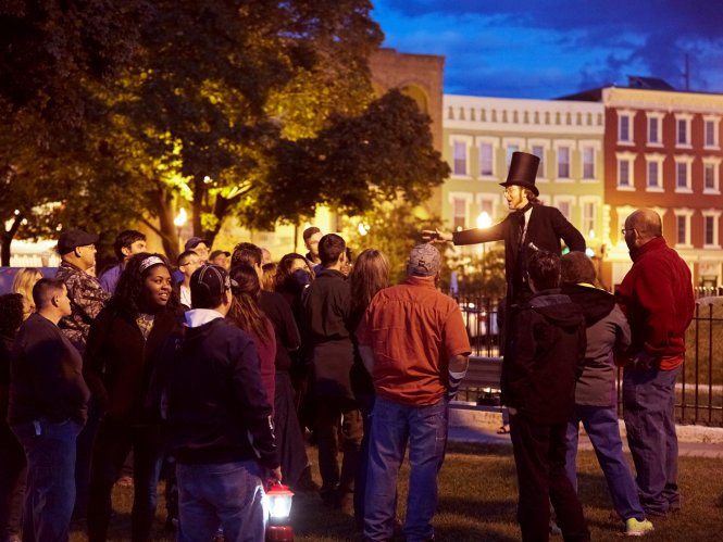 Matt Boire of The Greater Adirondack Ghost & Tour Company leading an evening ghost tour in Plattsburgh NY.